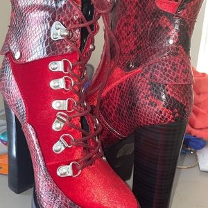 Red snake skin heeled boots